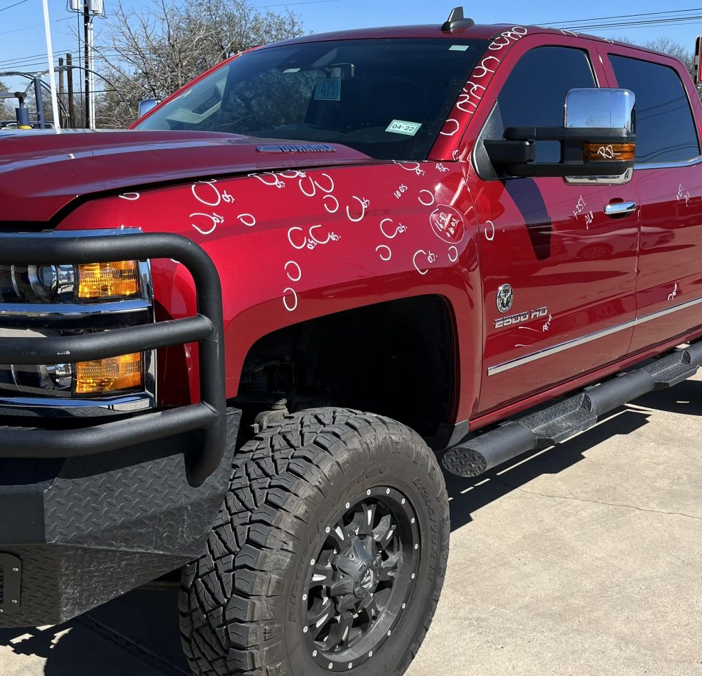 Paintless dent repair on a truck